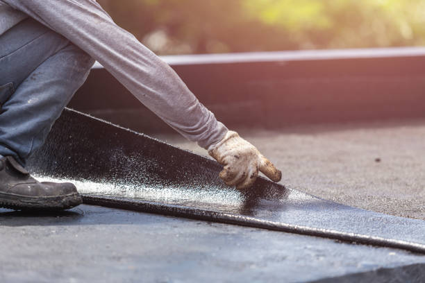 Professional Basement Waterproofing technician working in Schneider, IN